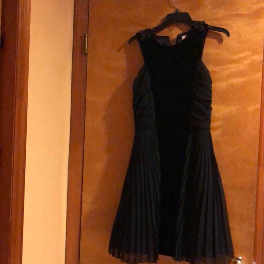 Cocktail velvet and satin dress with beaded work on shoulders. Zipper back